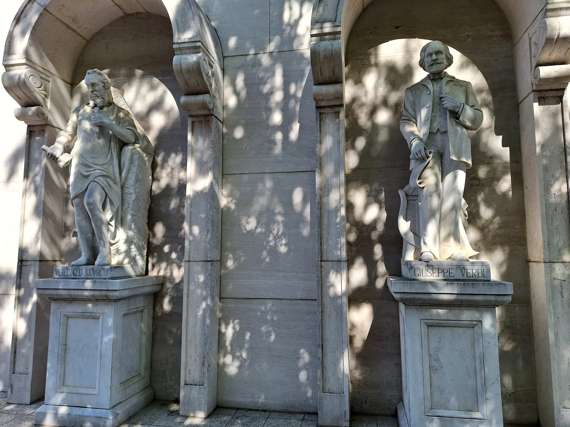 Statues of Michelangelo and Verdi